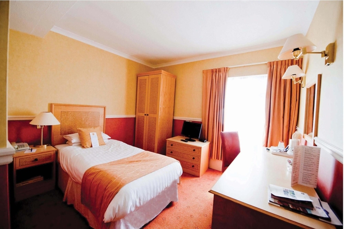 Imagen de la habitación del Hotel The Royal Beach. Foto 5