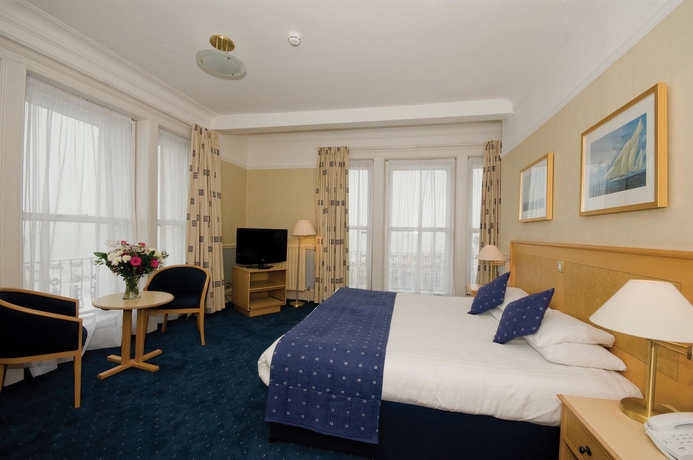 Imagen de la habitación del Hotel The Royal Beach. Foto 6