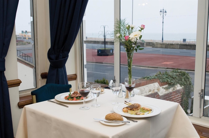 Imagen del bar/restaurante del Hotel The Royal Beach. Foto 3