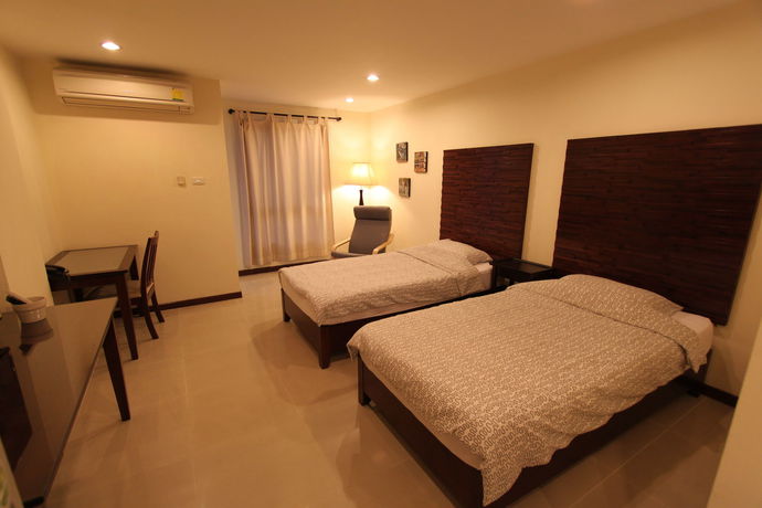 Imagen de la habitación del Hotel The Royal Bee Apart. Foto 7