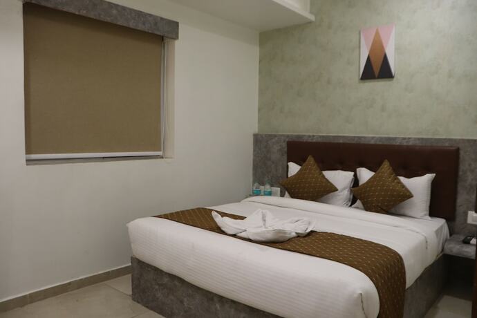 Imagen de la habitación del Hotel The Royal Castle Plaza. Foto 17