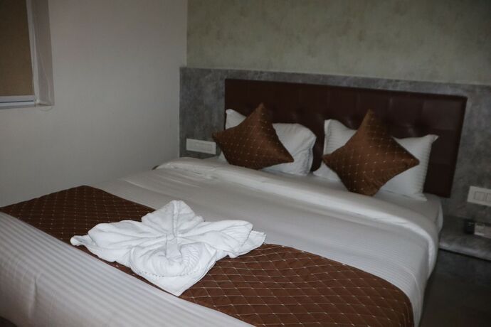 Imagen de la habitación del Hotel The Royal Castle Plaza. Foto 18
