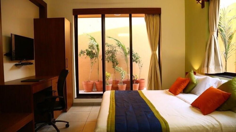 Imagen de la habitación del Hotel The Royal Castle Resort and Convention Centre, Rajkot. Foto 7