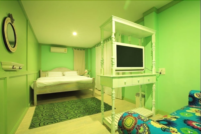 Imagen de la habitación del Hotel The Royal Chiangkhan Boutique. Foto 6