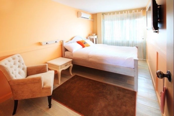 Imagen de la habitación del Hotel The Royal Chiangkhan Boutique. Foto 7