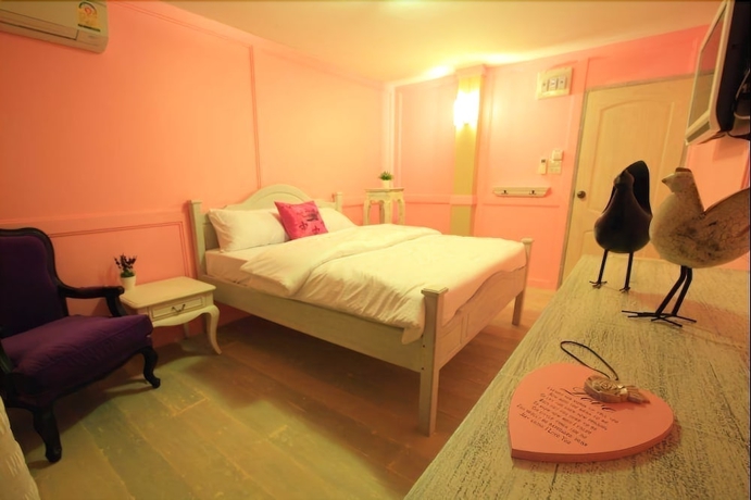 Imagen de la habitación del Hotel The Royal Chiangkhan Boutique. Foto 10