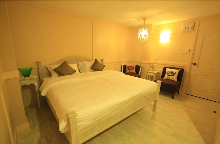 Imagen de la habitación del Hotel The Royal Chiangkhan Boutique. Foto 11