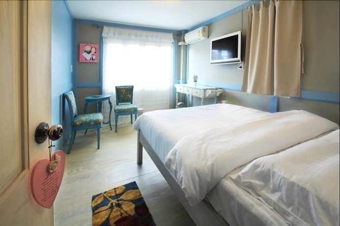 Imagen de la habitación del Hotel The Royal Chiangkhan Boutique. Foto 12