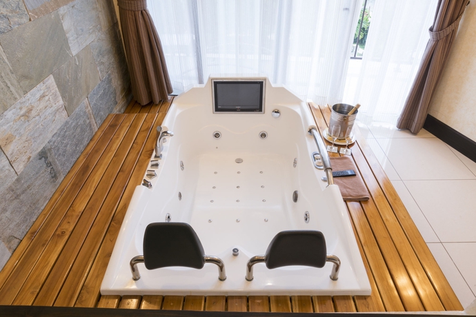 Imagen de la habitación del Hotel The Royal Corin Thermal Water Spa and Resort - Adults Only. Foto 4