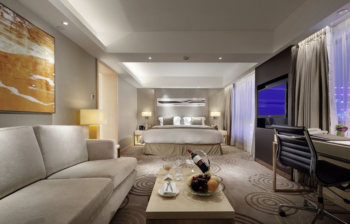 Imagen de la habitación del Hotel The Royal Garden. Foto 8