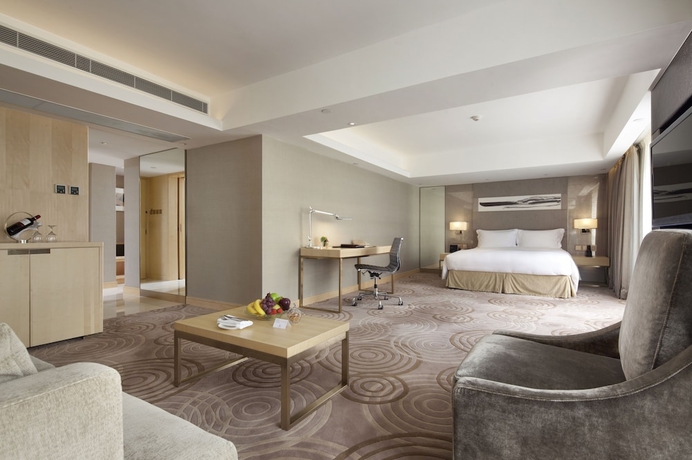 Imagen de la habitación del Hotel The Royal Garden. Foto 9