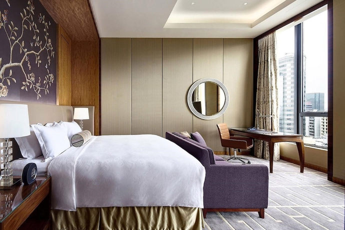 Imagen de la habitación del Hotel The Royal Garden. Foto 10