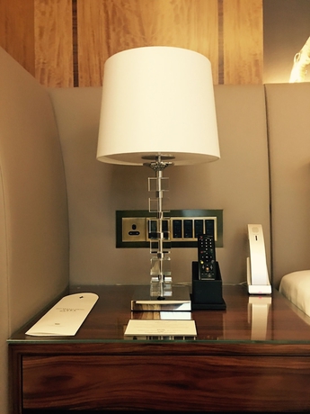 Imagen de la habitación del Hotel The Royal Garden. Foto 11