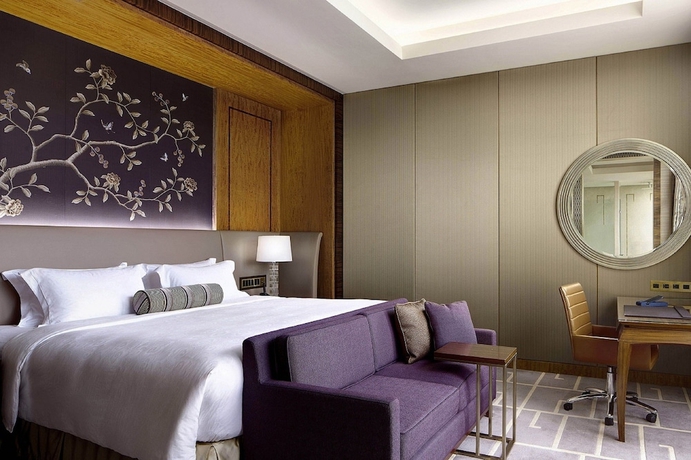 Imagen de la habitación del Hotel The Royal Garden. Foto 16