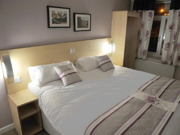 Imagen de la habitación del Hotel The Royal George, Birmingham. Foto 11