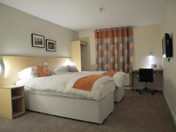 Imagen de la habitación del Hotel The Royal George. Foto 10