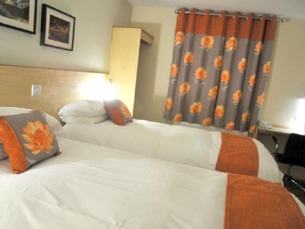 Imagen de la habitación del Hotel The Royal George. Foto 12