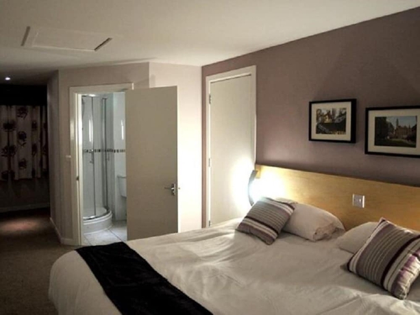 Imagen de la habitación del Hotel The Royal George. Foto 13