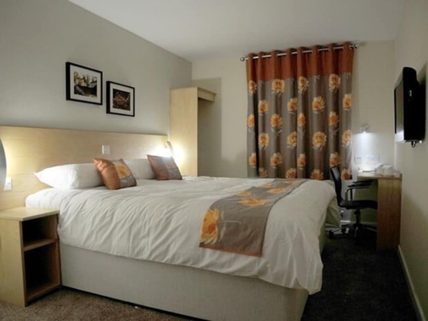 Imagen de la habitación del Hotel The Royal George. Foto 14