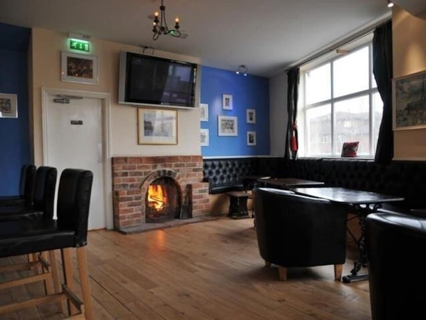 Imagen del bar/restaurante del Hotel The Royal George. Foto 5