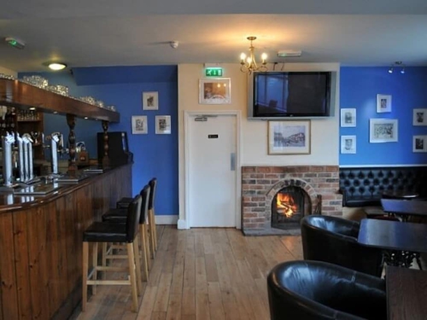 Imagen del bar/restaurante del Hotel The Royal George. Foto 7