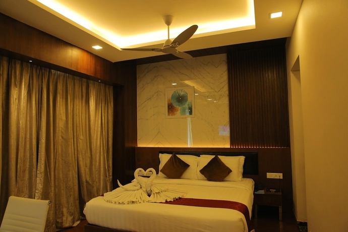 Imagen de la habitación del Hotel The Royal Grand. Foto 10