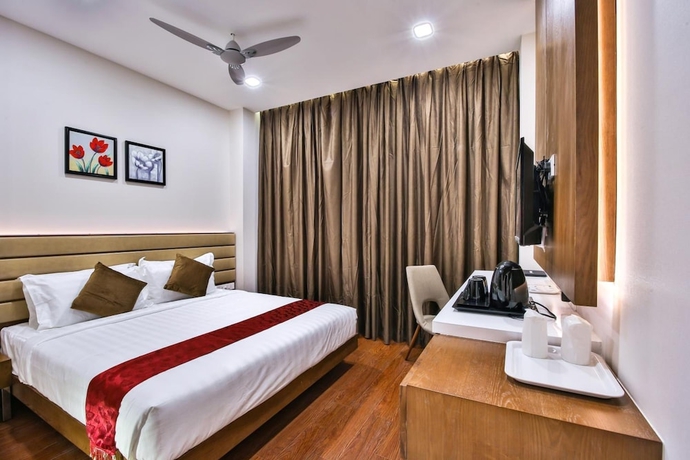 Imagen de la habitación del Hotel The Royal Grand. Foto 12