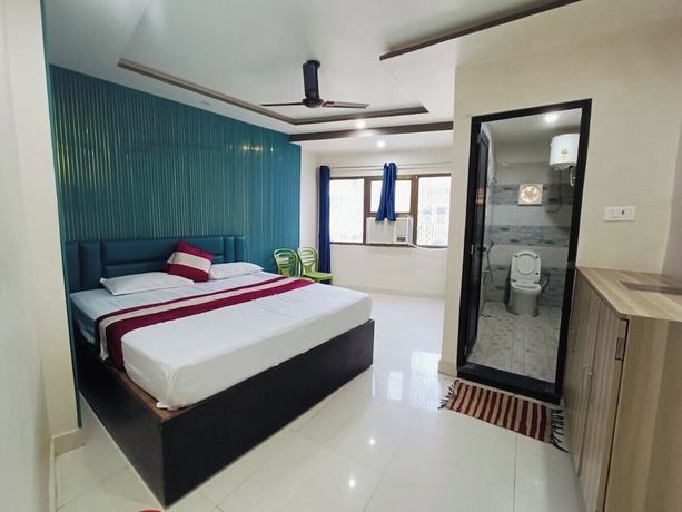 Imagen de la habitación del Hotel The Royal Green Residency. Foto 5