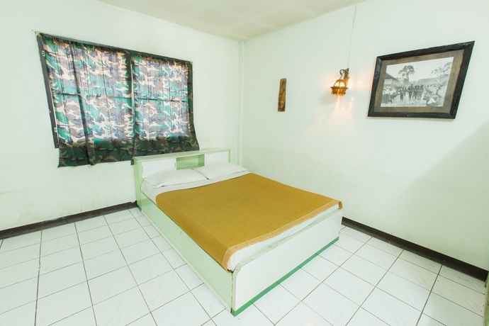 Imagen de la habitación del Hotel The Royal Guest House. Foto 9