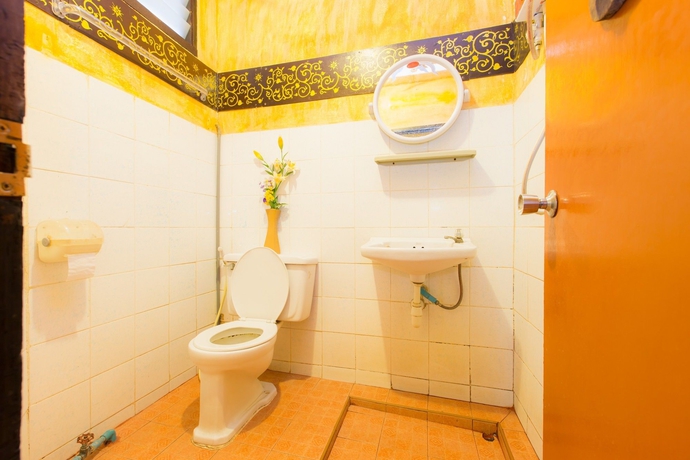 Imagen de la habitación del Hotel The Royal Guest House. Foto 10