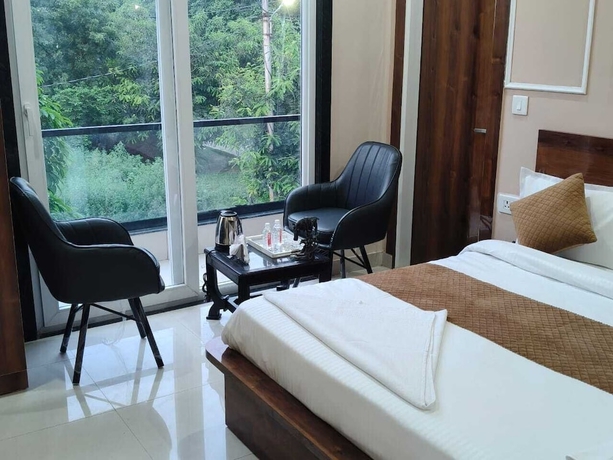 Imagen de la habitación del Hotel The Royal Harmony. Foto 11