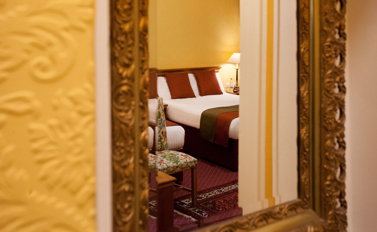 Imagen de la habitación del Hotel The Royal Highland. Foto 11