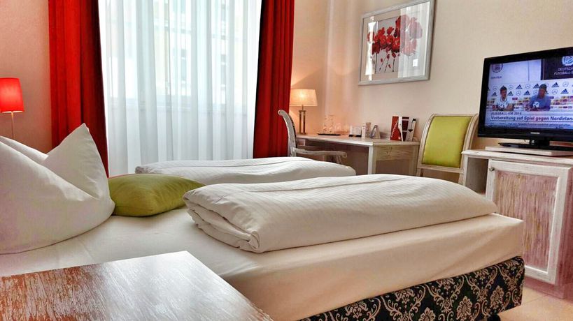 Imagen de la habitación del Hotel The Royal Inn Regent. Foto 3