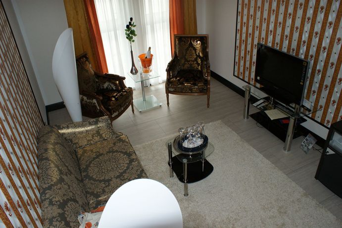 Imagen de la habitación del Hotel The Royal Inn Regent. Foto 5