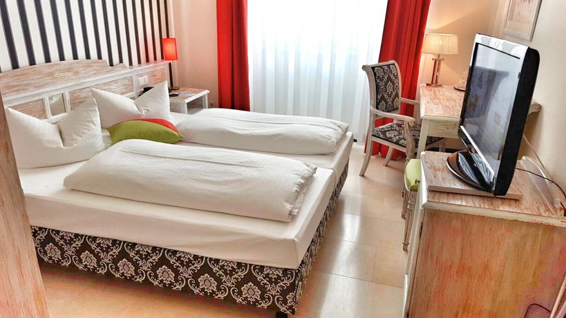 Imagen de la habitación del Hotel The Royal Inn Regent. Foto 10