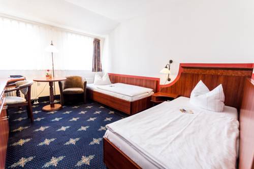 Imagen de la habitación del Hotel The Royal Inn Wilder Mann Annaberg. Foto 5