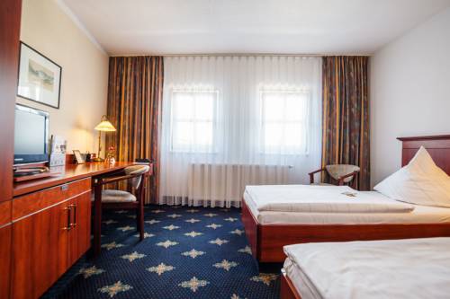 Imagen de la habitación del Hotel The Royal Inn Wilder Mann Annaberg. Foto 7