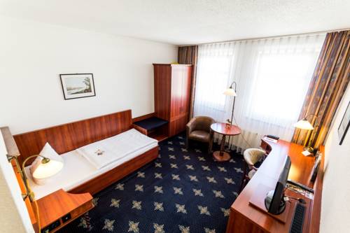 Imagen de la habitación del Hotel The Royal Inn Wilder Mann Annaberg. Foto 13