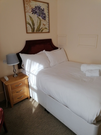 Imagen de la habitación del Hotel The Royal Lion. Foto 9