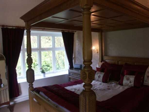 Imagen de la habitación del Hotel The Royal Lodge. Foto 14