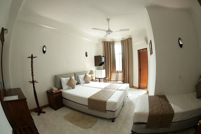 Imagen de la habitación del Hotel The Royal Mall Kandy. Foto 14