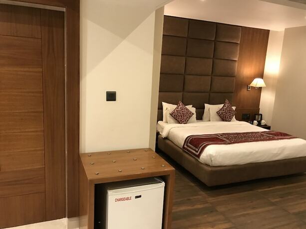 Imagen de la habitación del Hotel The Royal Melange Beacon. Foto 16