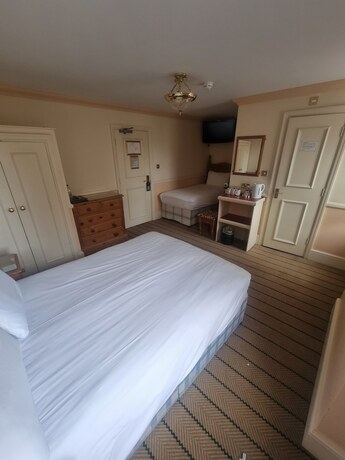 Imagen de la habitación del Hotel The Royal Oak. Foto 14