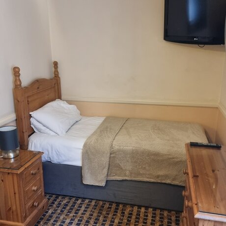 Imagen de la habitación del Hotel The Royal Oak. Foto 15