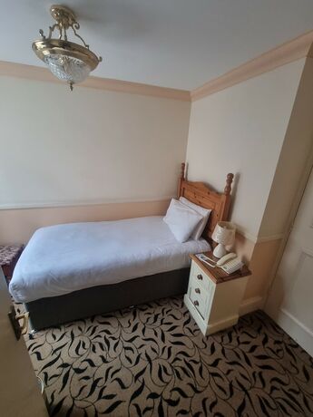 Imagen de la habitación del Hotel The Royal Oak. Foto 16