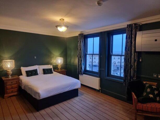 Imagen de la habitación del Hotel The Royal Oak. Foto 18