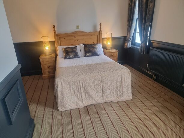 Imagen de la habitación del Hotel The Royal Oak. Foto 19