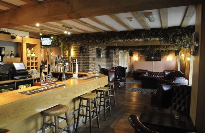 Imagen del bar/restaurante del Hotel The Royal Oak Historic Commercial Inn. Foto 7