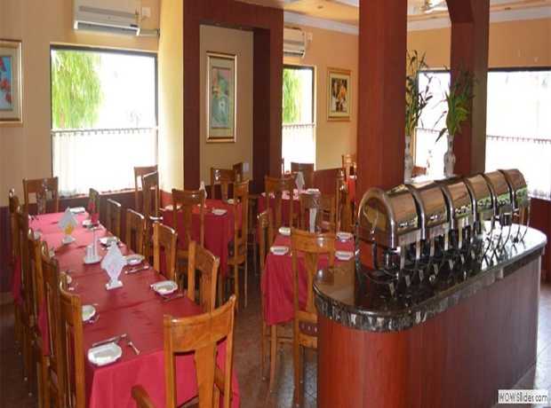 Imagen del bar/restaurante del Hotel The Royal Orchid, Dzongkhag Thromde. Foto 7