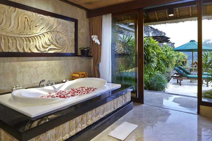 Imagen de la habitación del Hotel The Royal Pita Maha. Foto 4